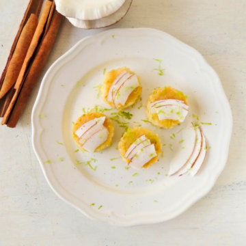 Dominican baked coconut dessert coco horneado golden crust with lime zest